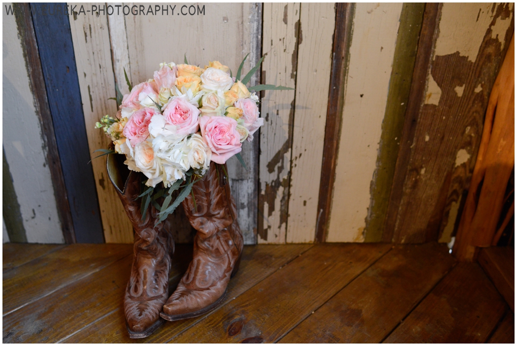 Vintage Rustic Wedding Details (Bridal Bouquet in cowboy boots against chipped paint wall)