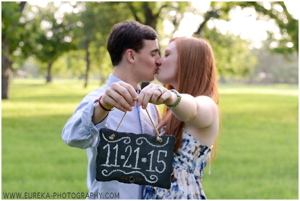 Prop ideas for your engagement photos: chalkboard Sign with Wedding Date for save the date cards