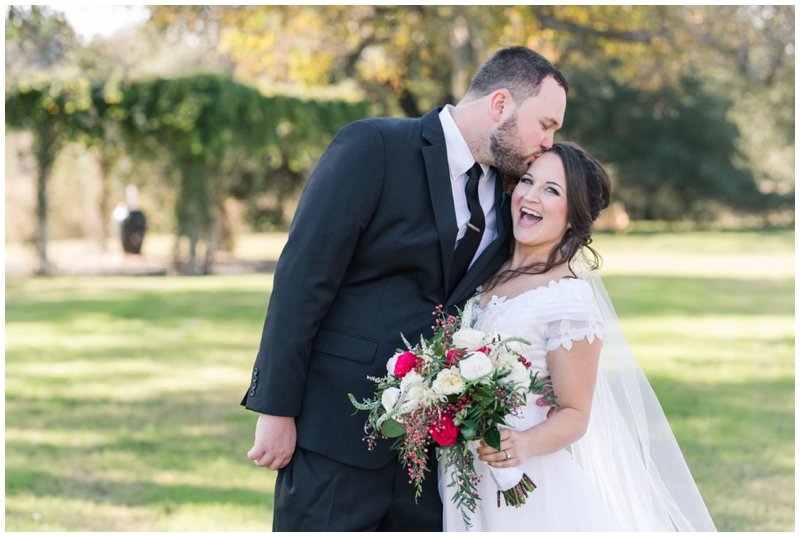 Fall Wedding at Pecan Springs Ranch with cranberry bridal bouquet 
