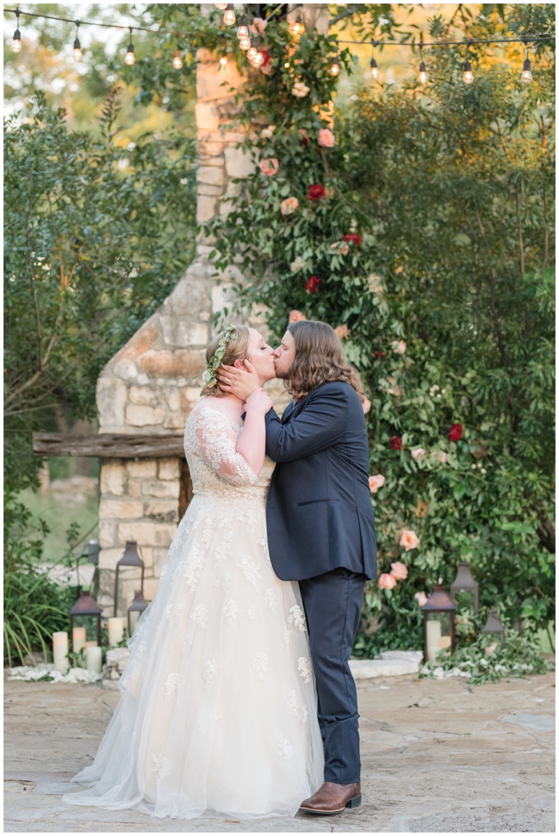 Climbing Floral over fireplace of Pecan Springs Ranch ceremony site