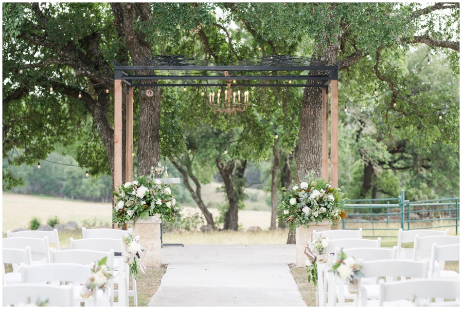 White and Green wedding ceremony set up at CW Hill Country Ranch