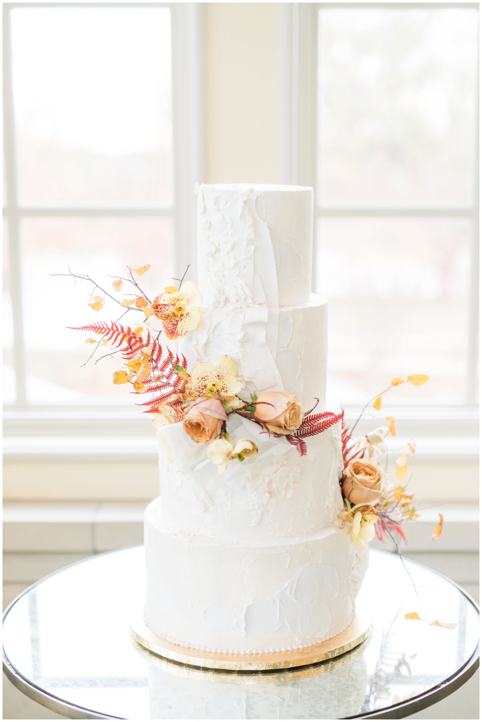 Fall Wedding Cake Inspiration in yellow with fall foliage and orchids 