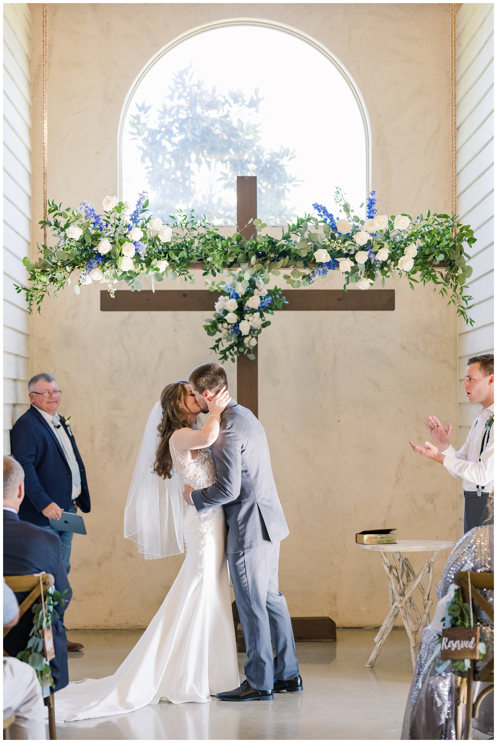 Indoor wedding ceremony at Lone Oak Barn in Round Rock Texas