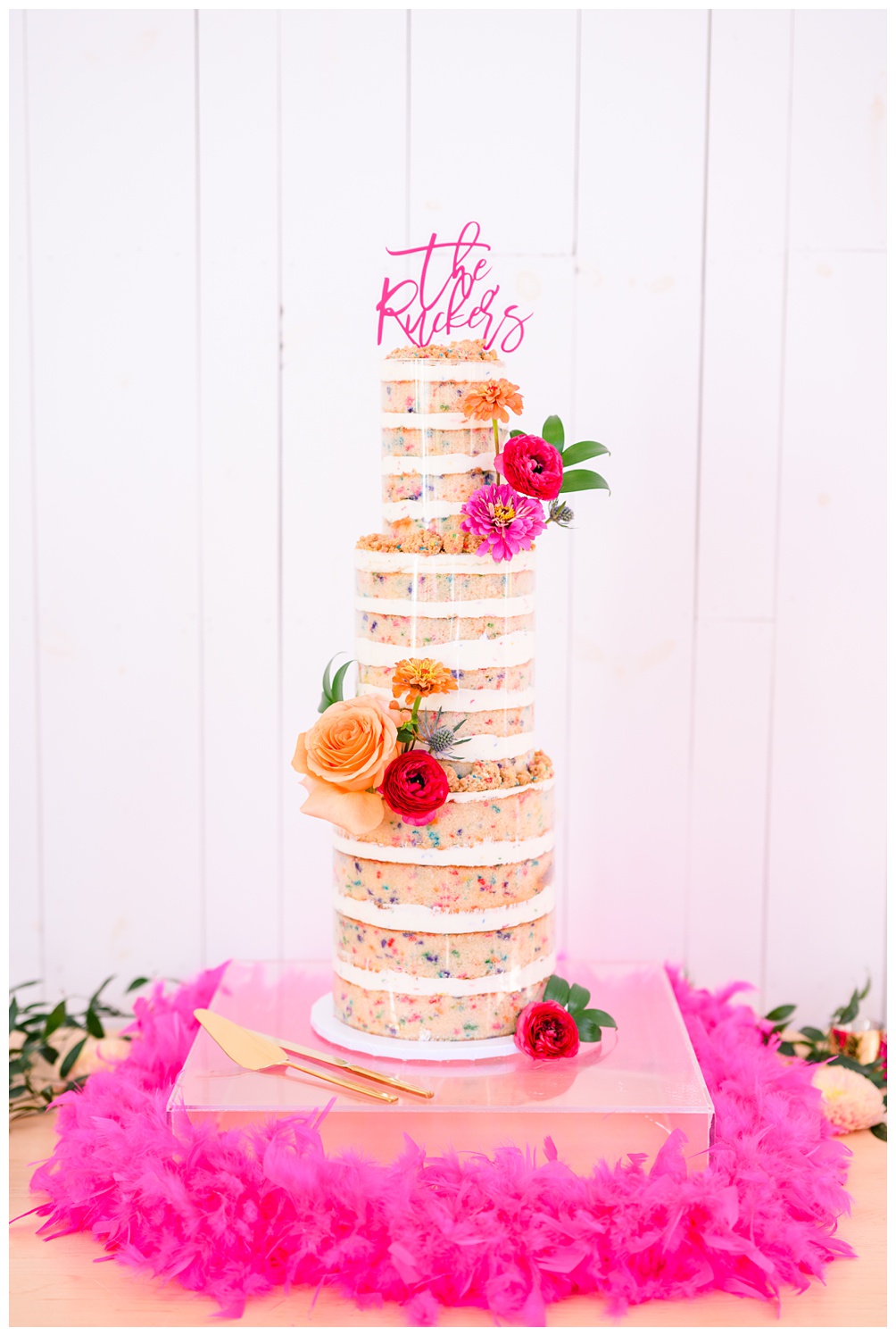 Feathers and Frosting Wedding Cake in Hot Pink