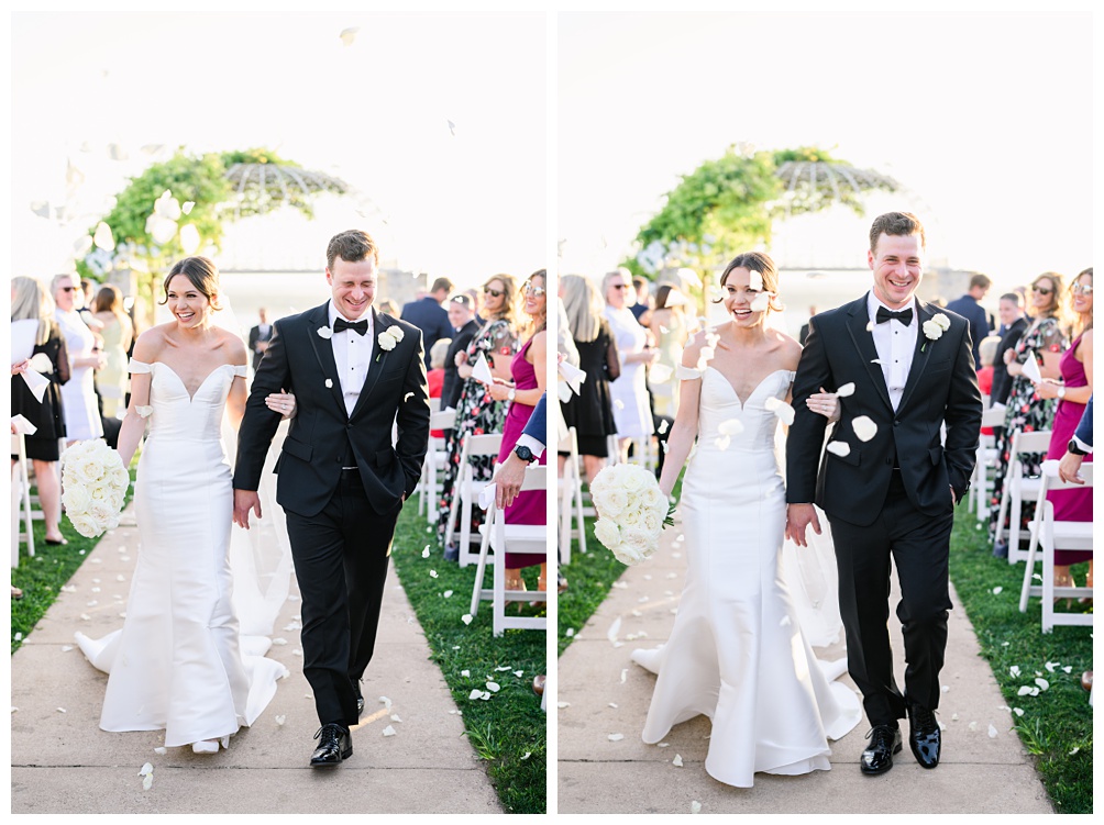 Rose petal toss as newly married couple recesses down the aisle at their Vintage Villas wedding ceremony in black tie attire
