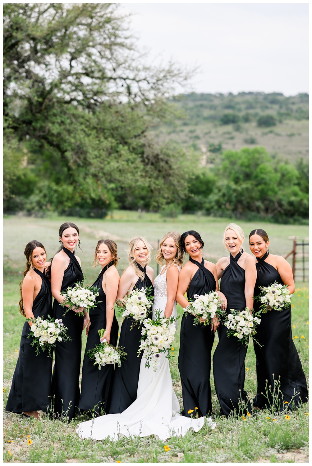 Bridesmaids in black dresses from show me your mumu