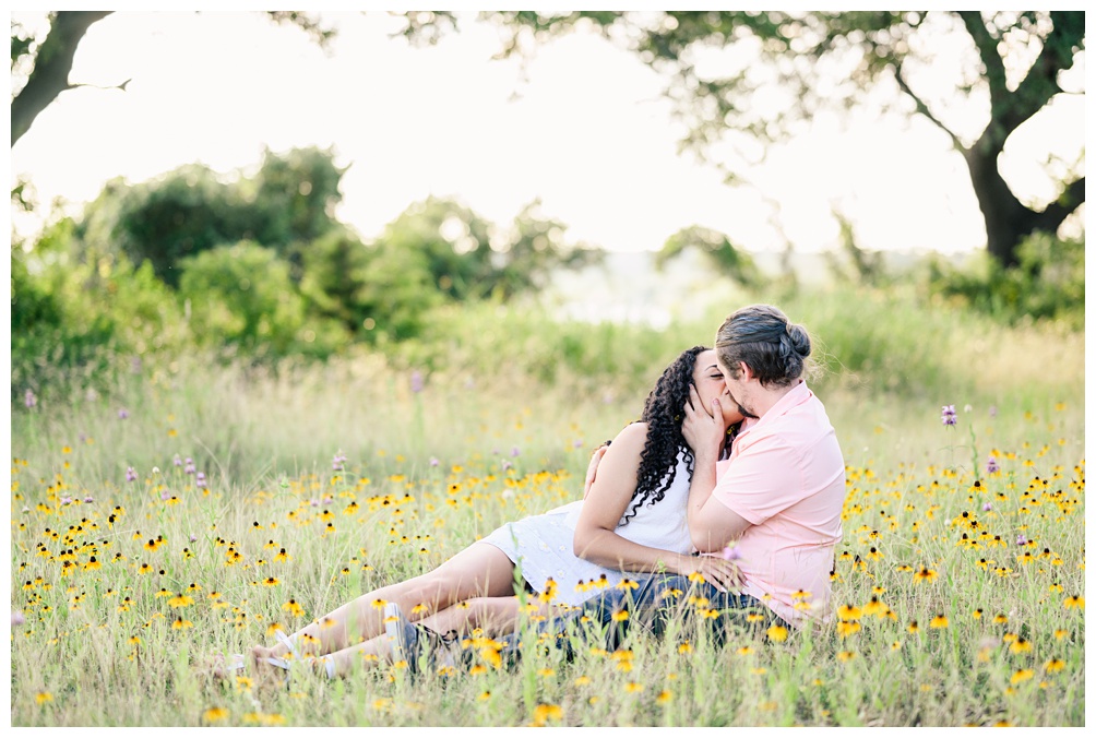 Engagement photos in a field of wildflowers at Overlook Park in Georgetown Texas