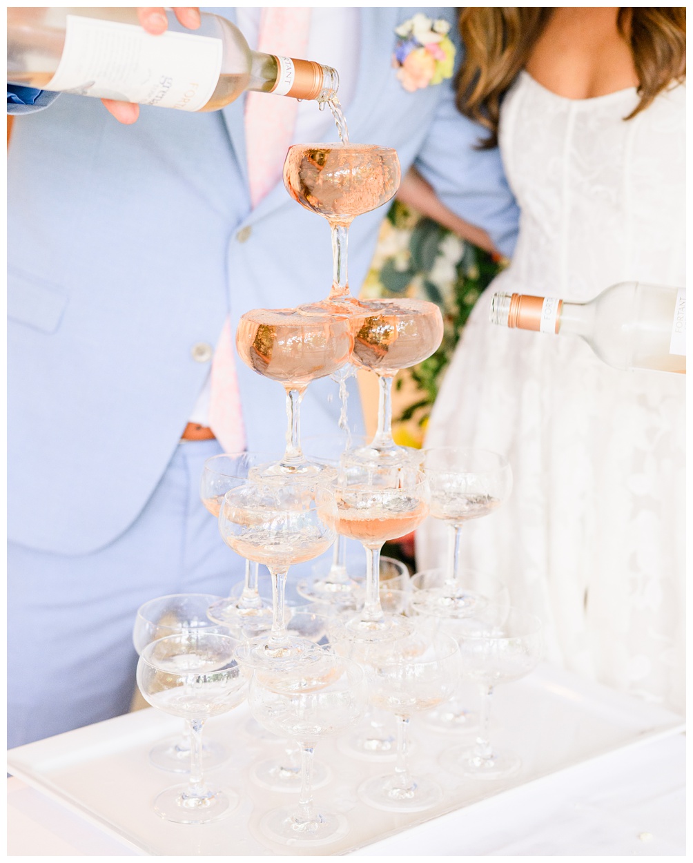 Shady Villa Hotel Wedding Photographer shares Rose Tower pour by bride and groom at Stagecoach Restaurant Brunch reception in Salado Texas