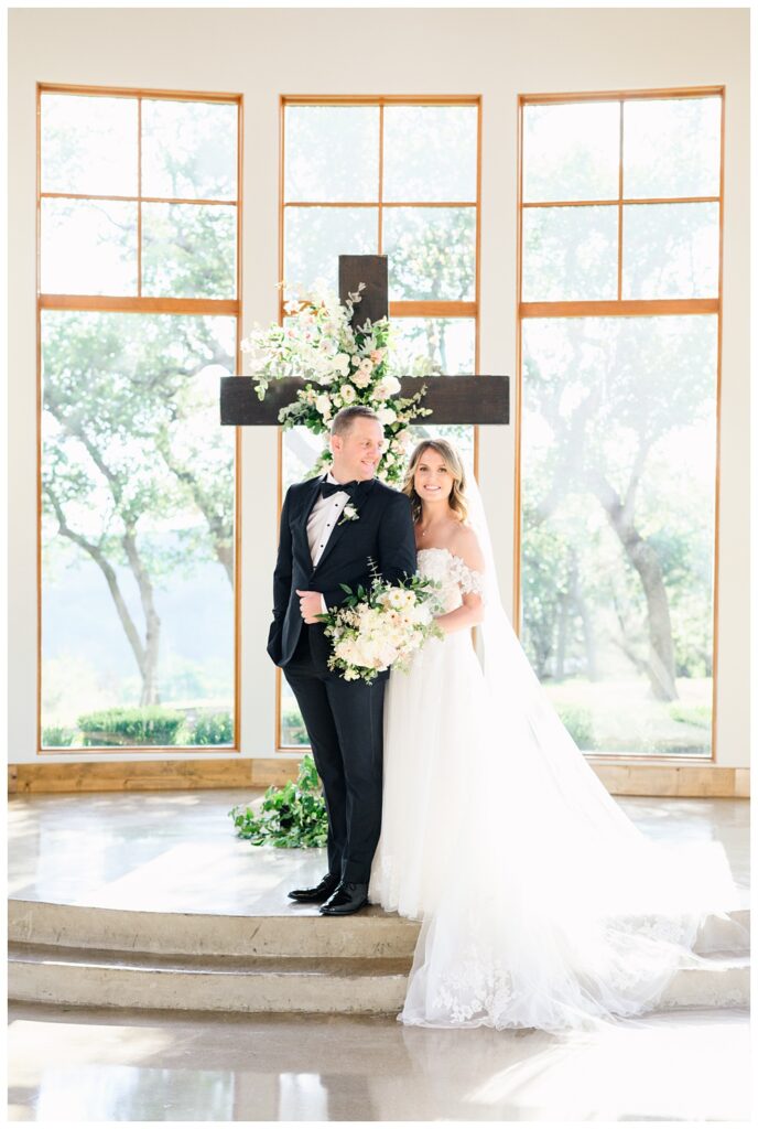 Bride and groom sharing a joyful moment during golden hour portraits at Canyonwood Ridge
