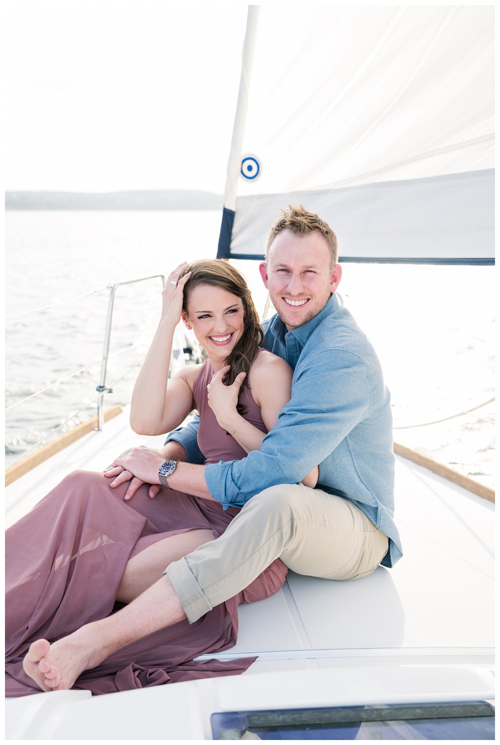 Lake Travis boat engagement photos with couple on sailboat in Austin Texas