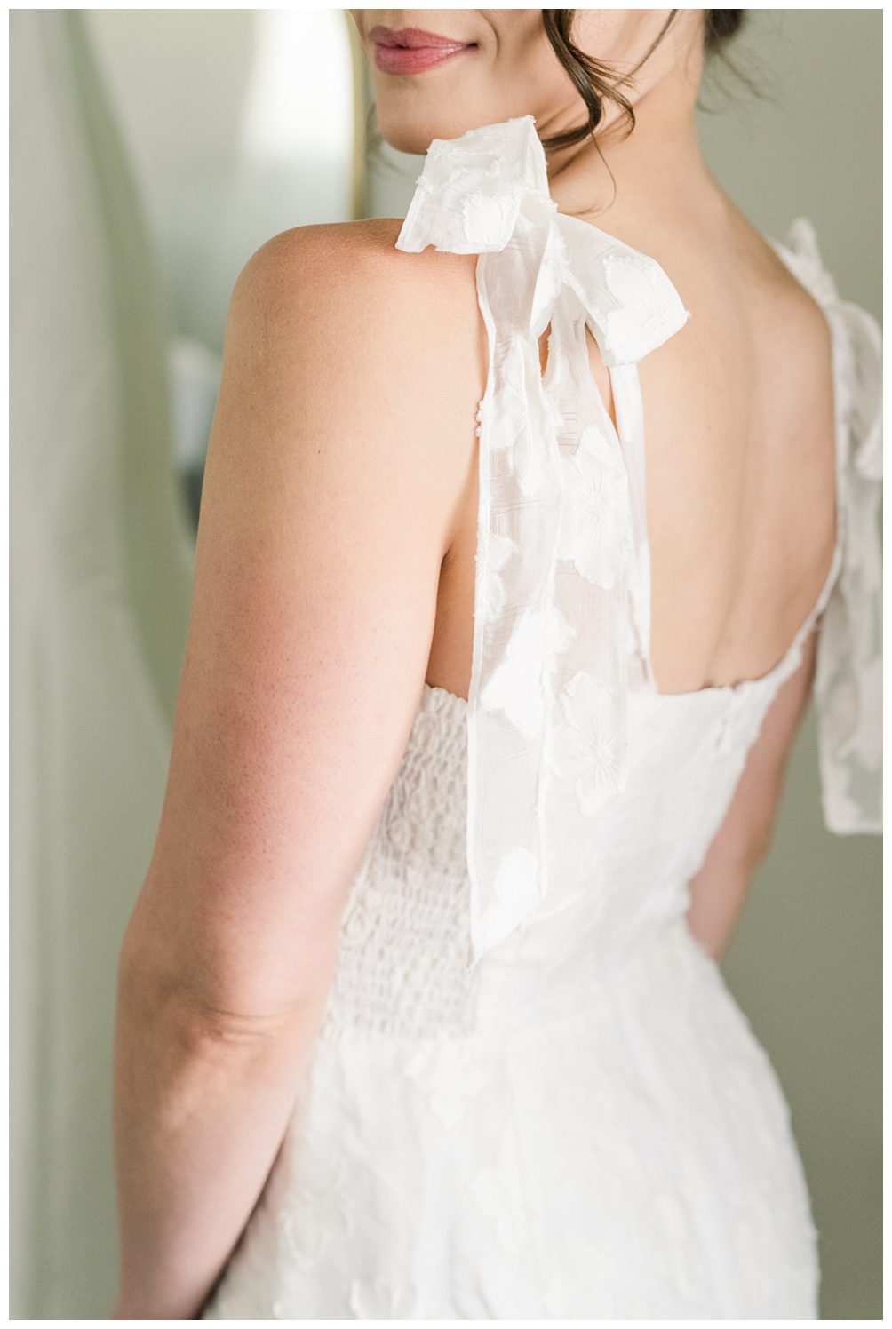 Bridal romper with bow sleeves